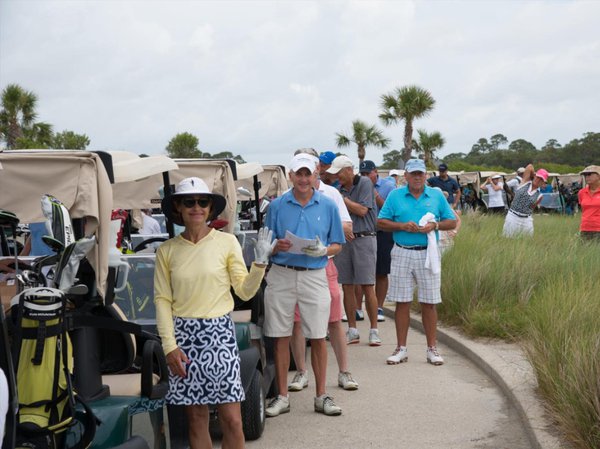 all smiles at the sea island habitat for humanity golf tournament.jpg